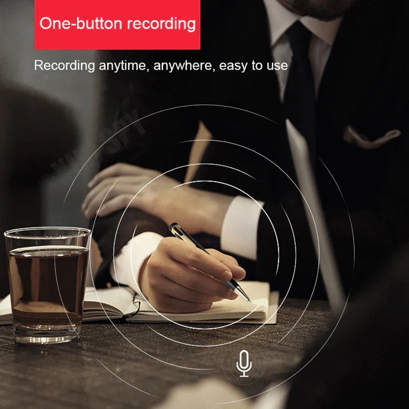 Black pen with silver accents held writing in a notebook featuring voice recorder mini and professional usb flash dictaphone micro audio
