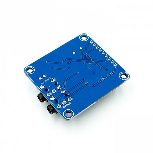 Blue rectangular vs1053 mp3 module development board with silver solder pads and onboard recording function audio jacks