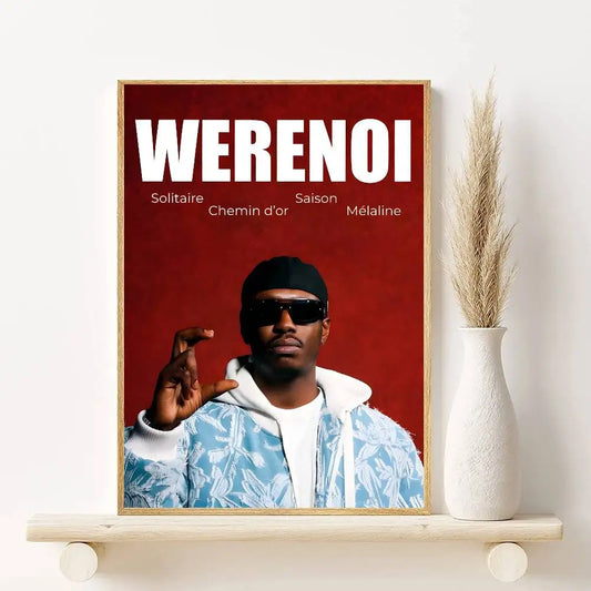 A framed modern graphic poster of a man in sunglasses with a red background for living room decor