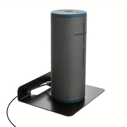 Black and blue cylindrical speaker on a floating bracket metal speaker wall bracket for placing small speakers