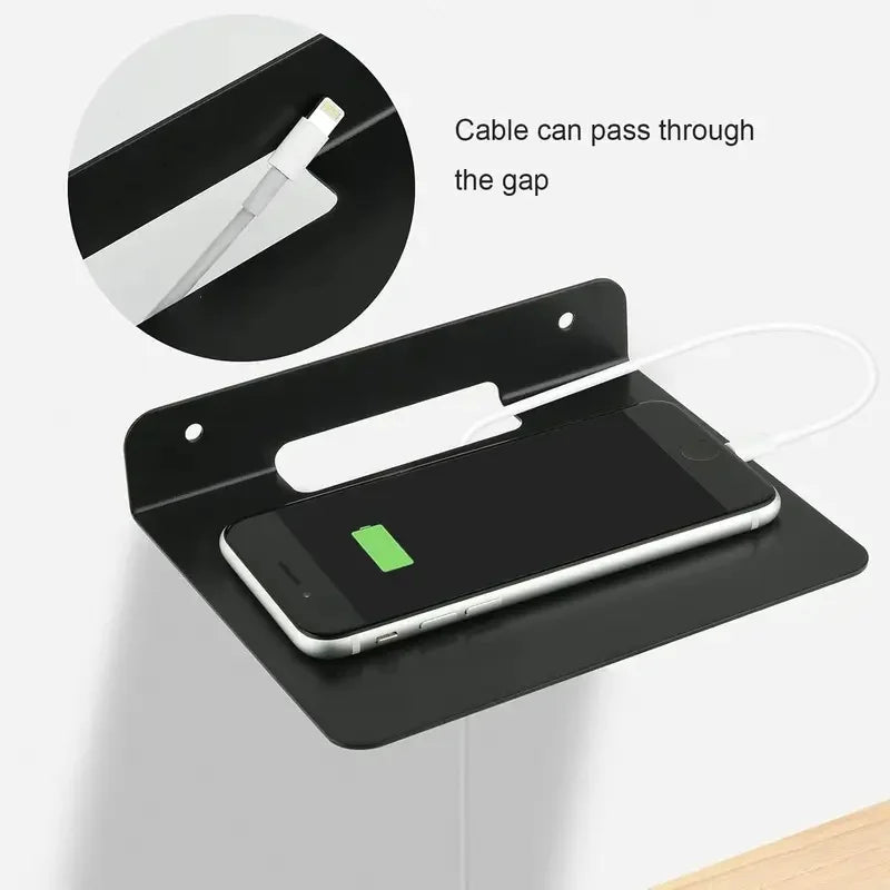 Black metal wall mounted floating bracket with cable pass through gap for placing small speakers and routers