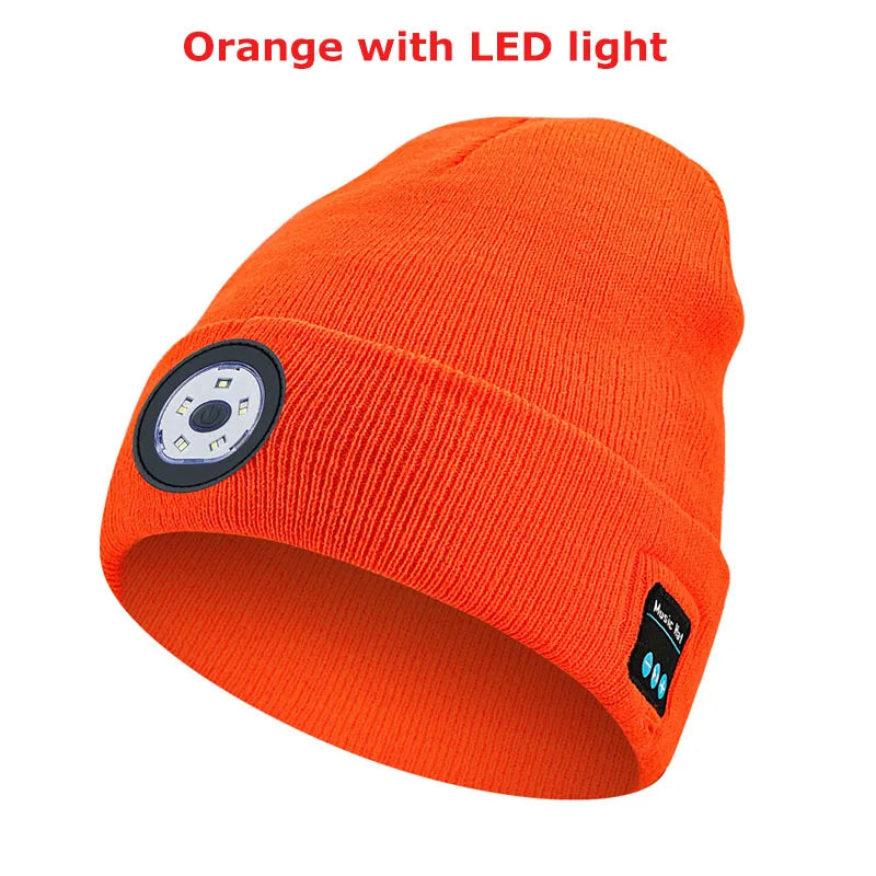 Bright orange knit warm beanie with led light panel and bluetooth music control button for handsfree use