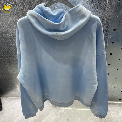 A soft light blue washed blue paly fleece hoodie with relaxed fit high quality casual zipper for men and women