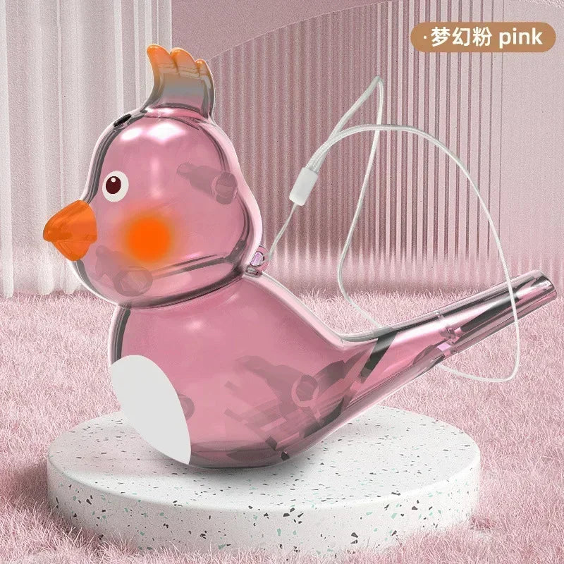A translucent pink bird whistle children toy with orange beak and feet for oral muscle pronunciation training