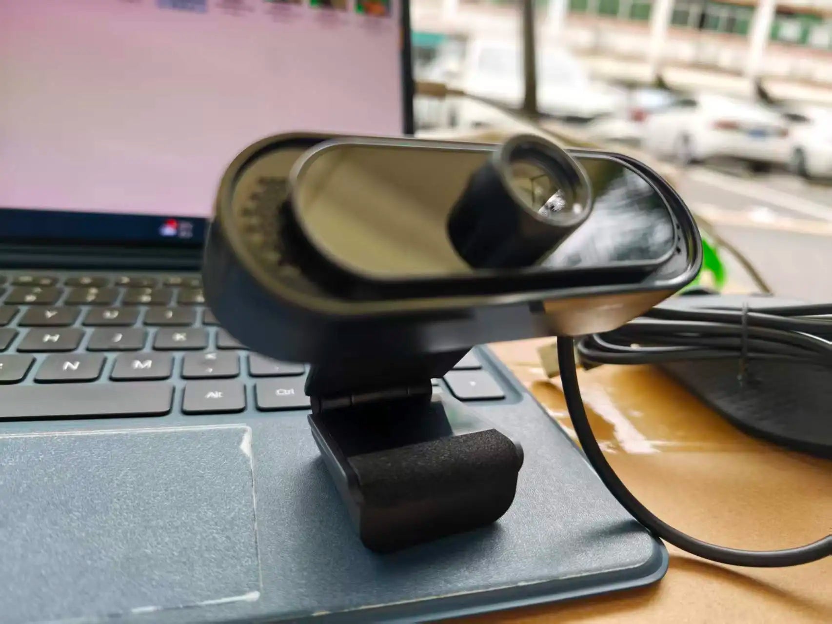 Black webcam with microphone usb computer camera featuring a sleek glossy finish for zoom teams streaming and video calls