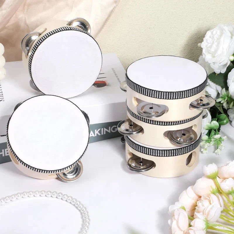 Cream-colored wedding tambourine drum with white drumhead, black beaded trim, wood metal jingles percussion gift wood