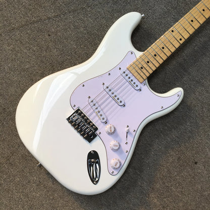 White st electric guitar with maple fingerboard features sparkling sss chrome and light purple pickguard