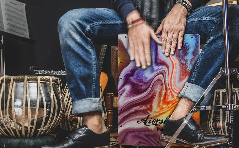 A vibrant swirling rainbow-colored custom wooden cajon drum with glossy finish and visible brand logo for wholesale price export experience