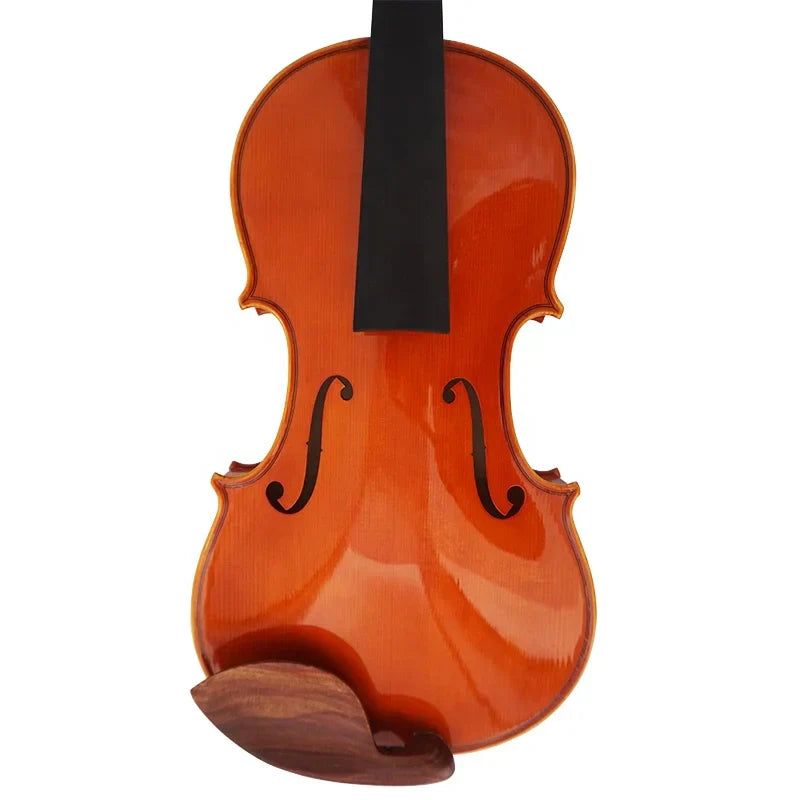 A polished warm amber handmade professional Italian violin string instrument with glossy finish and black f-holes