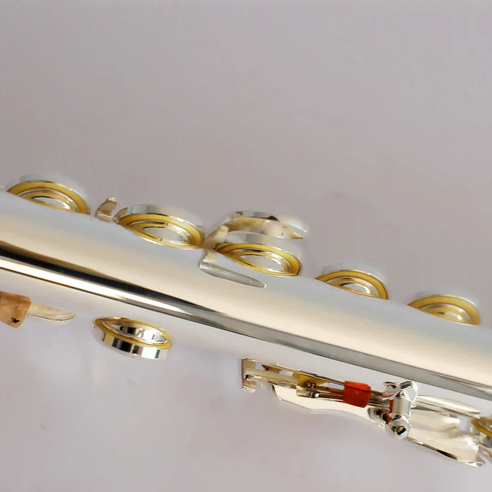 Professional silver-plated hole performance flute with gold-colored keys and red-tipped mechanism flute open design wind instruments