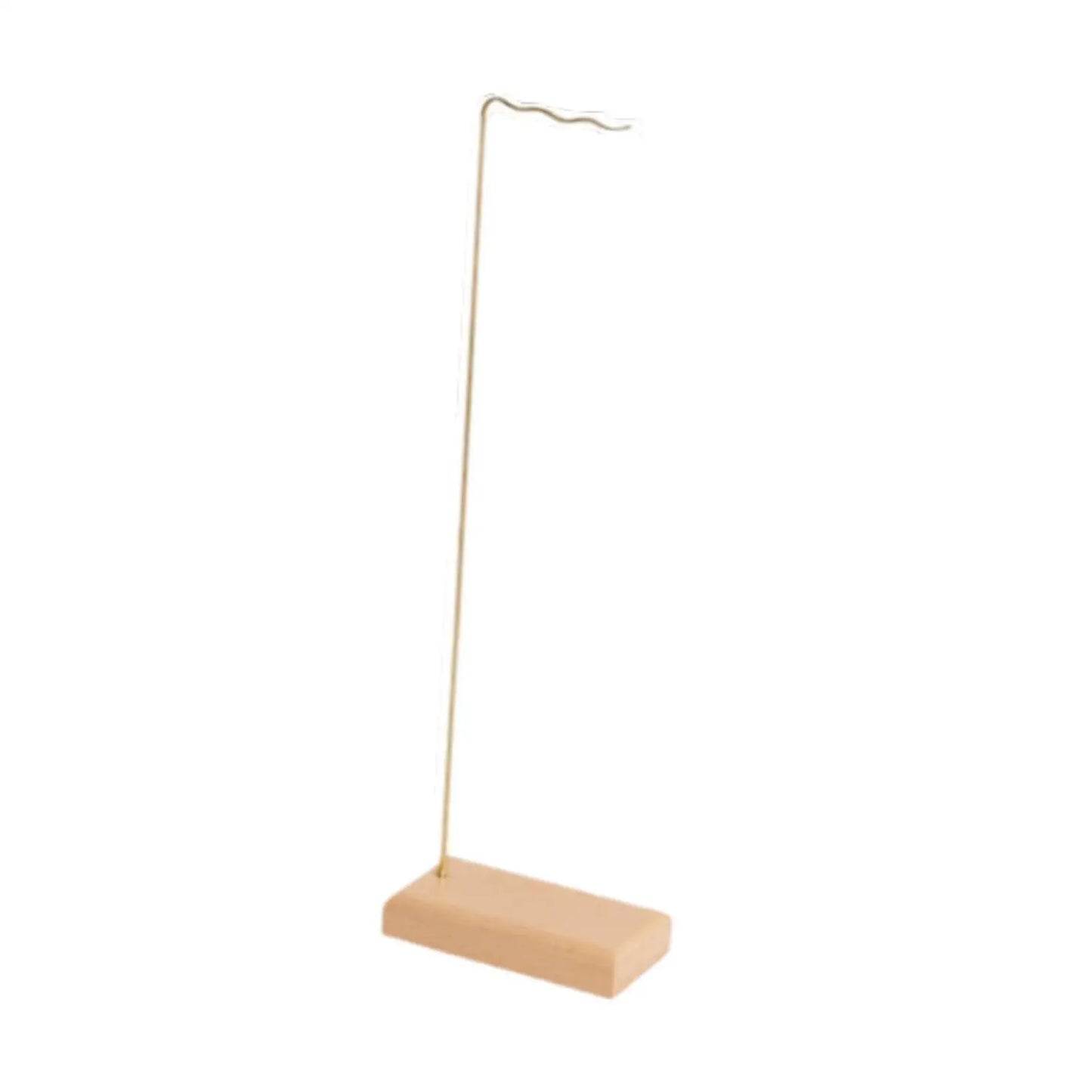 Minimalist gold-toned metal wind chime stand with rectangular wooden base and wavy hook for wedding event home decor