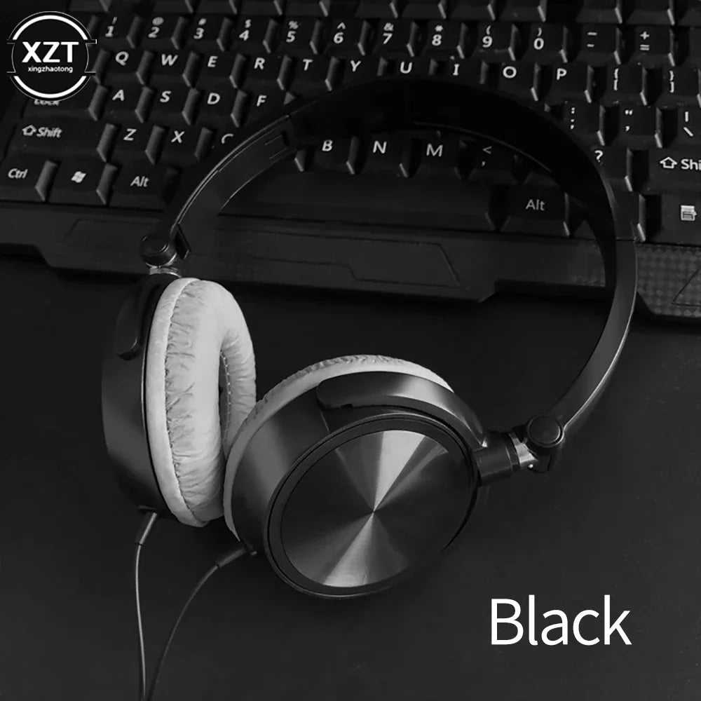 Black wired over-ear headphones with silver circular earcups and white padded cushions for headsets hd sound and music stereo earphone uses