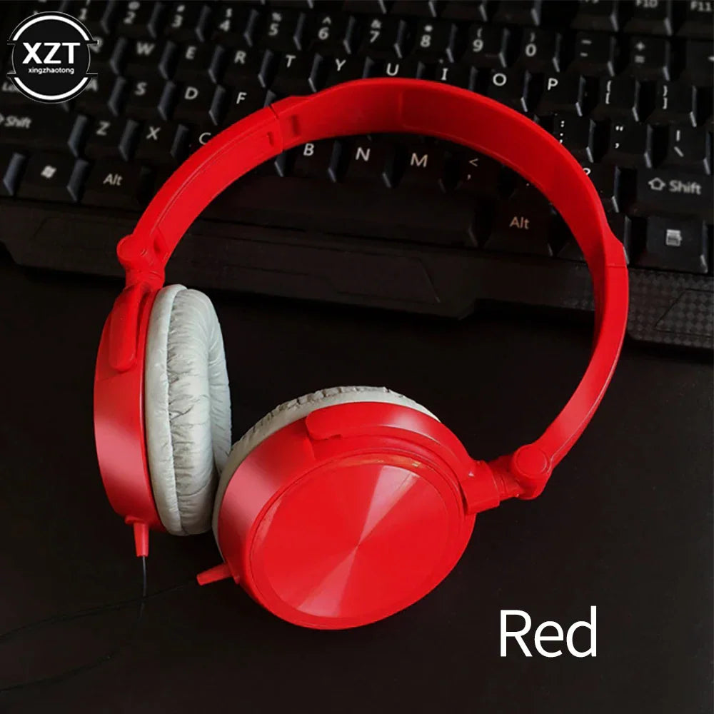 Red over-ear wired headphones with white padded earcups featuring hd sound bass and flexible adjustable headset design