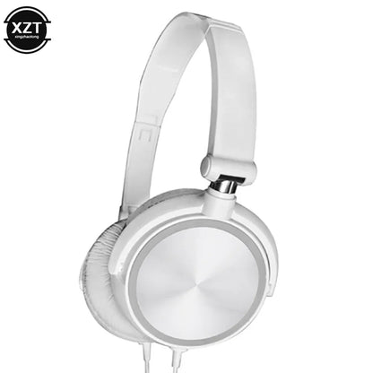 White over-ear wired headphones with sleek metallic silver faceplate padded earcups flexible adjustable headset for hd sound