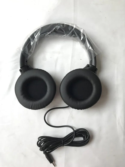 Black professional studio headphone with padded earcups and coiled cable for dj headphones music headset earphone use