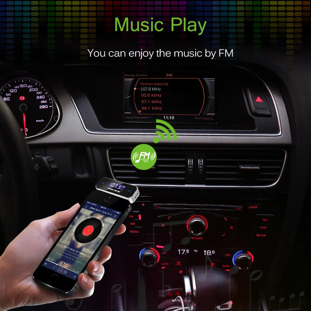 Black smartphone displaying music playback controls on screen of handsfree car mp3 audio fm transmitter device