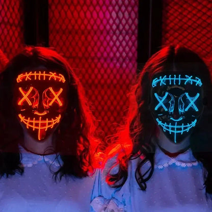 Two glowing led wireless bar music festival neon purification masks in orange and blue with stitched facial designs for dark cosplay costume