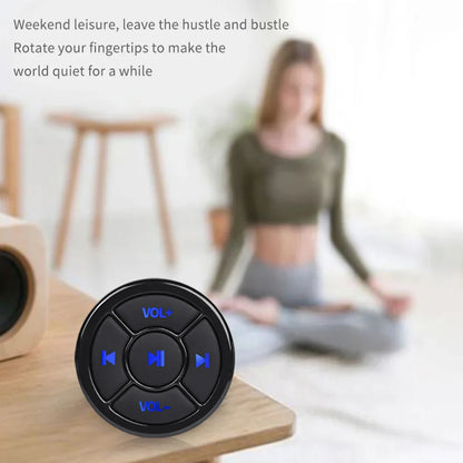 Black circular remote controller media button car motorcycle knob with blue illuminated steering wheel music controls