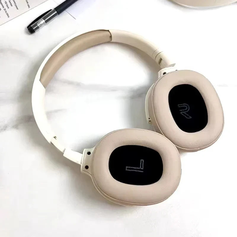 Beige wireless bluetooth 5.3 ear hifi stereo headphones with soft padded earcups and sleek white headband for sports use