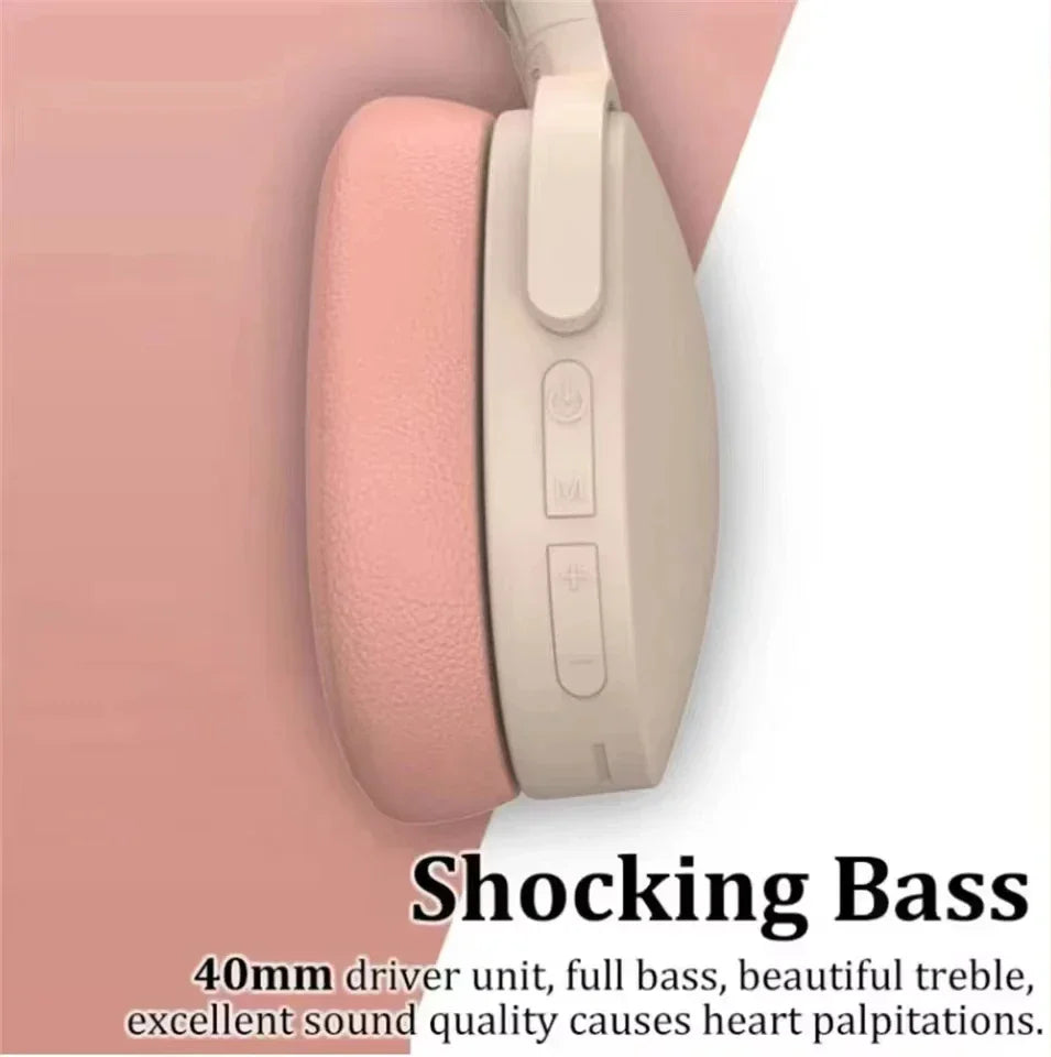 Pastel pink wireless bluetooth 5.3 ear hifi stereo headphones with padded earcups and beige headband control buttons