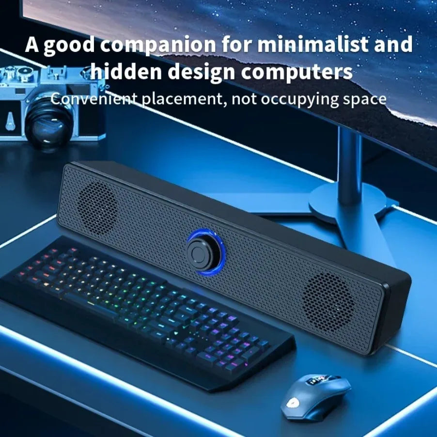 Black usb powered soundbar with blue illuminated knob and perforated grille for gaming home theater surround audio system