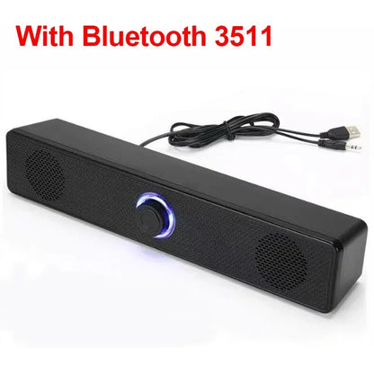 Black rectangular usb powered soundbar with blue illuminated volume knob and textured surface for gaming home theater use