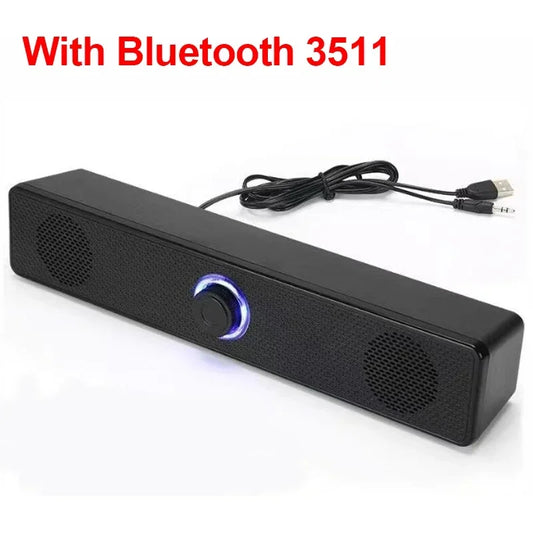 Black rectangular usb powered soundbar with blue illuminated volume knob and textured surface for gaming home theater use