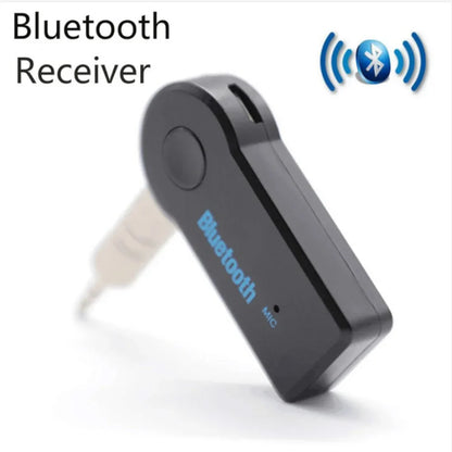 Black plastic wireless bluetooth 5.0 receiver with circular button and blue bluetooth branding 3.5mm socket adapter converter mobile phone hands-free stereo