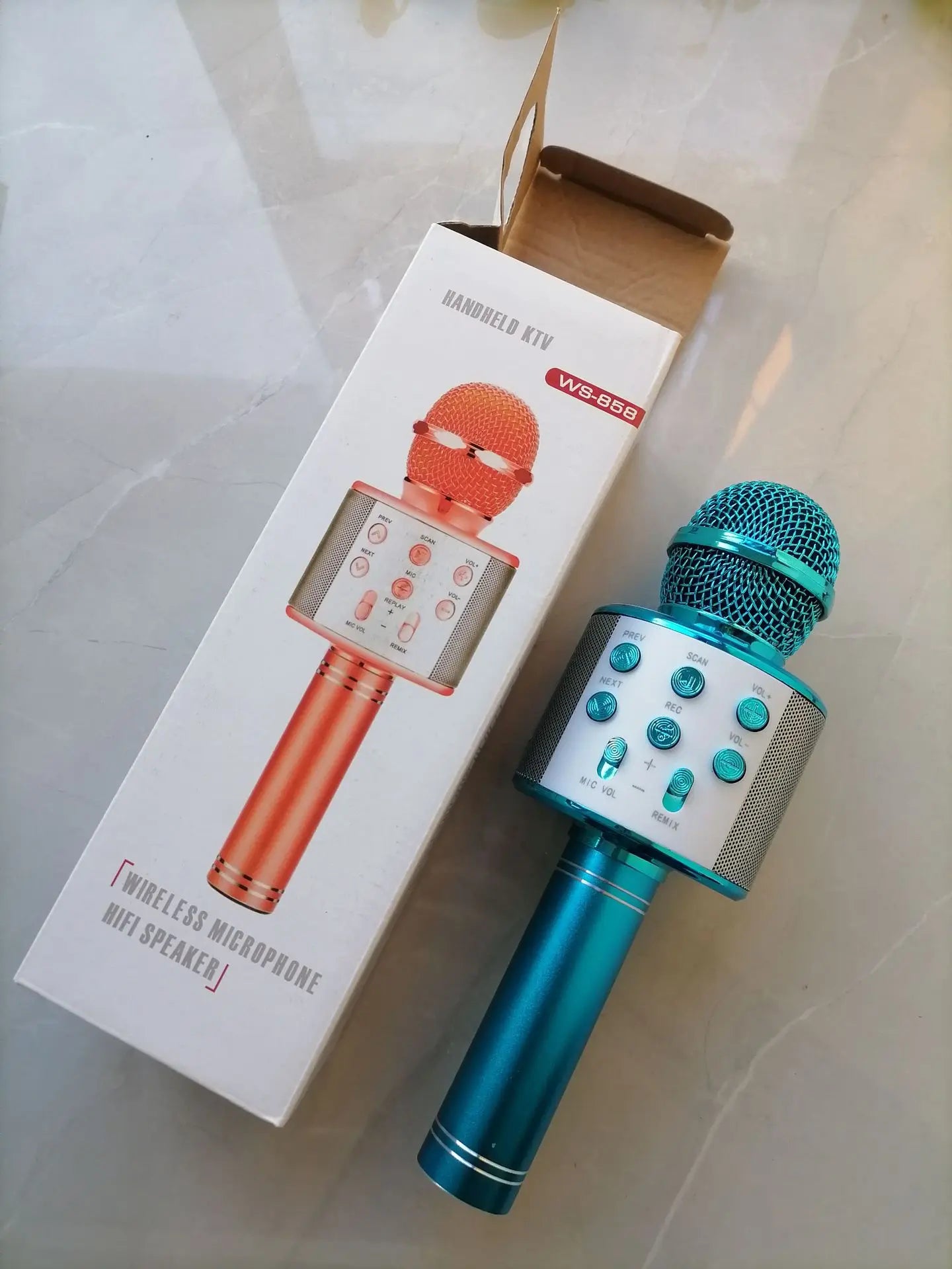 Teal wireless bluetooth K12 microphone with built-in speaker and control buttons for adults karaoke microphone and portable party use