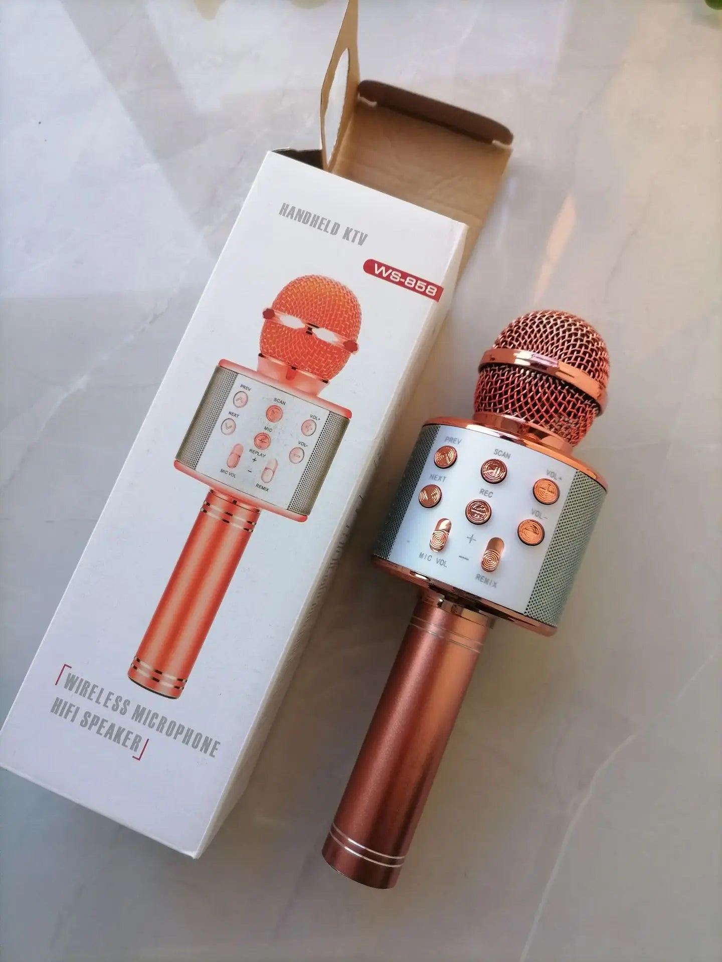 Rose gold wireless bluetooth k12 microphone with built-in speaker and control buttons for portable party and adults karaoke