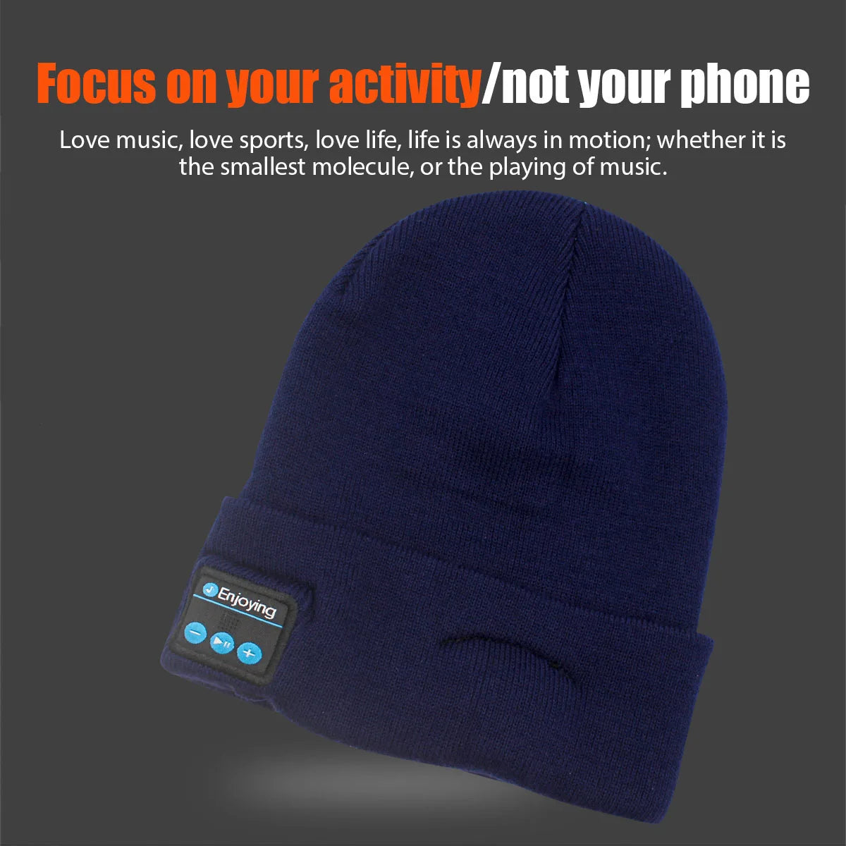 Navy blue knitted hat headphone with built-in wireless bluetooth music speaker and control buttons on cuff