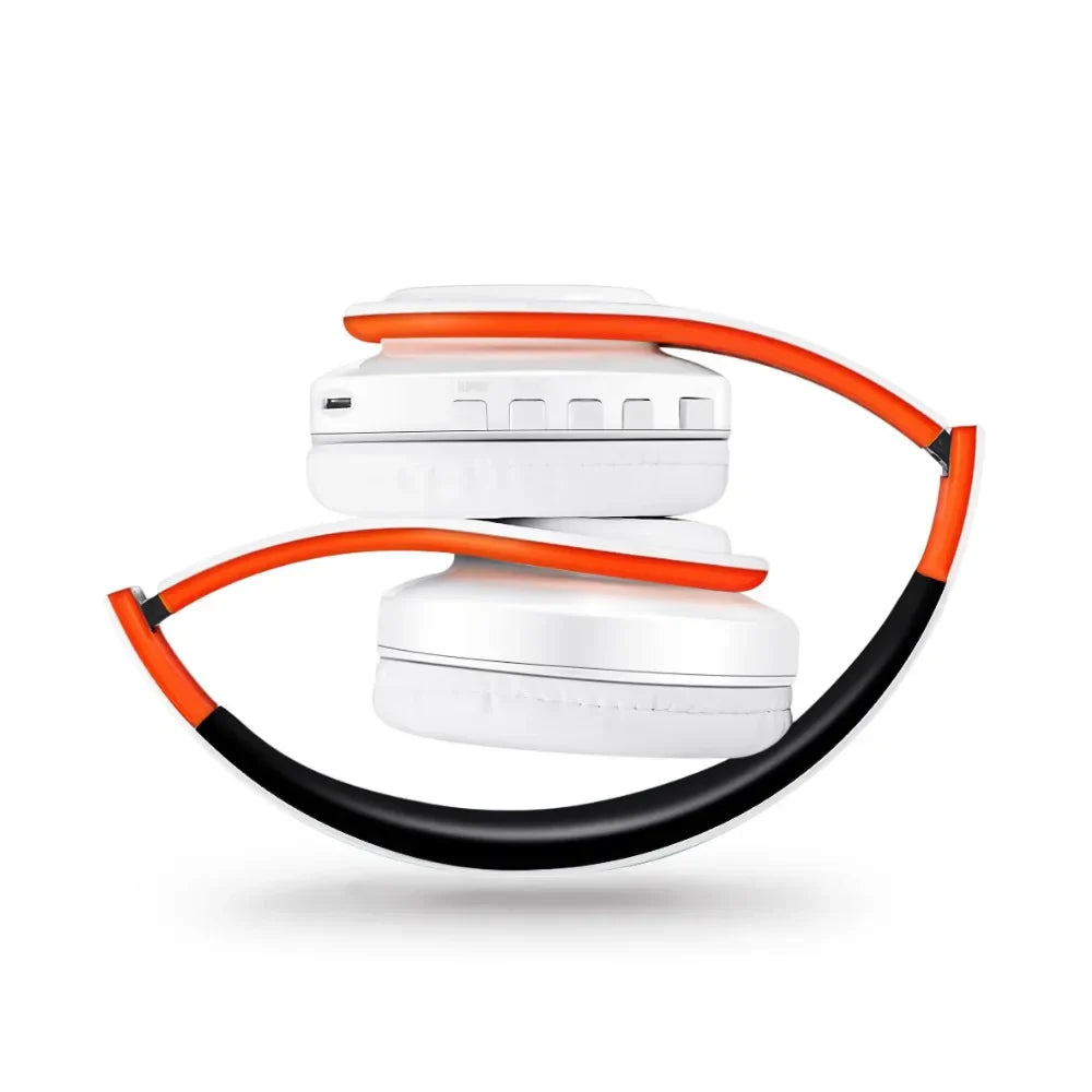 White over-ear wireless bluetooth music headphones with vibrant orange and black headband and microphone stereo bass