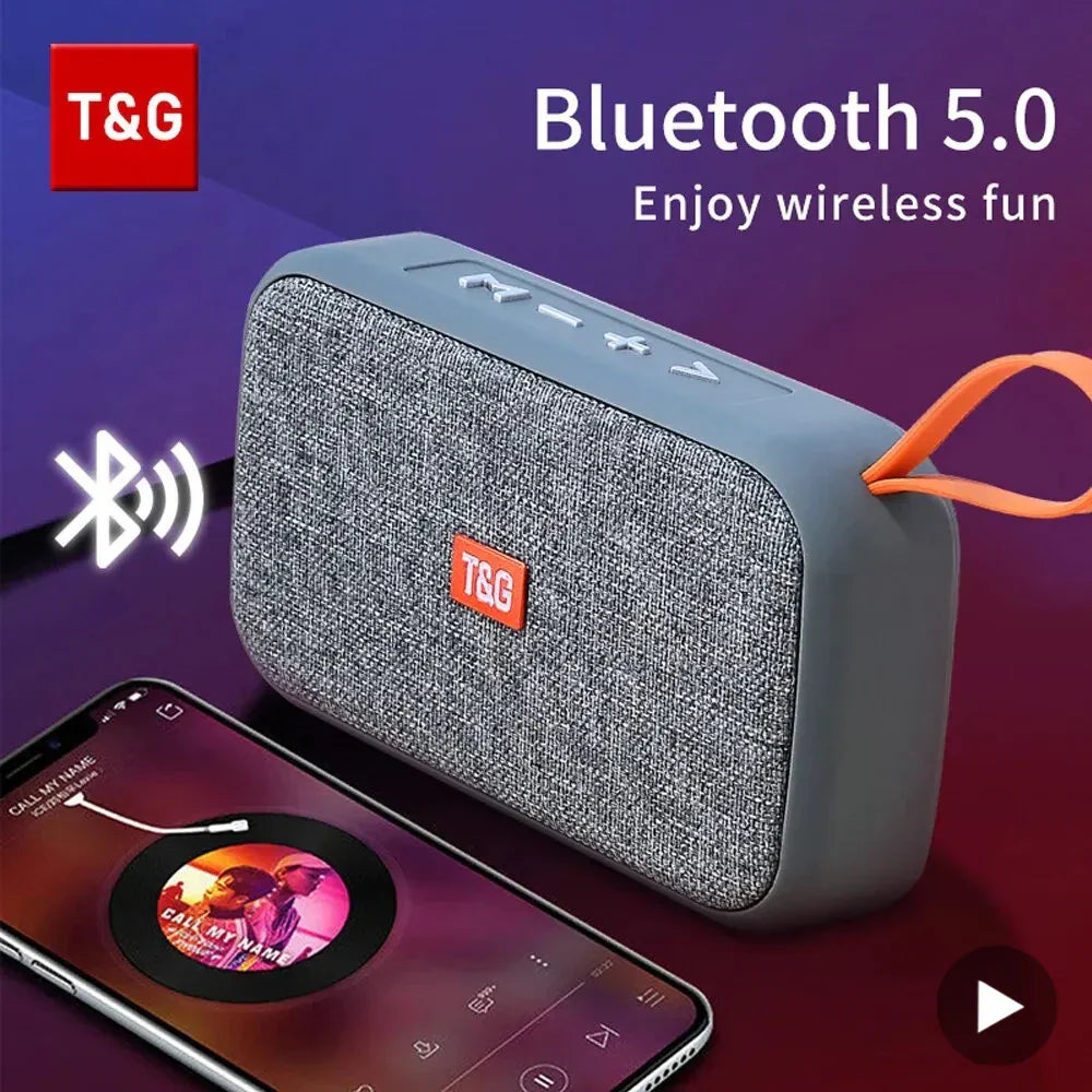 Gray textured fabric wireless bluetooth speaker with orange accent strap featuring radio fm waterproof small subwoofer sound