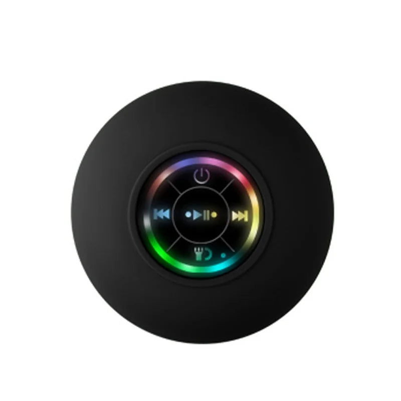 Black circular wireless bluetooth speaker with colorful led ring featuring stereo surround subwoofer for outdoor use