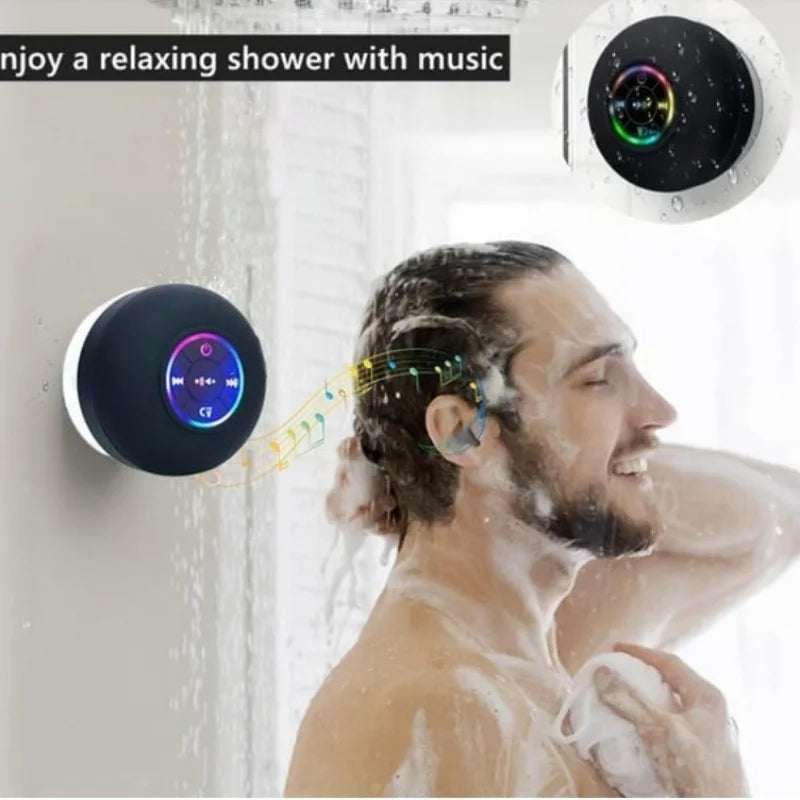 Black and white wireless bluetooth speaker with colorful illuminated controls steel gun metal subwoofer outdoor mini device