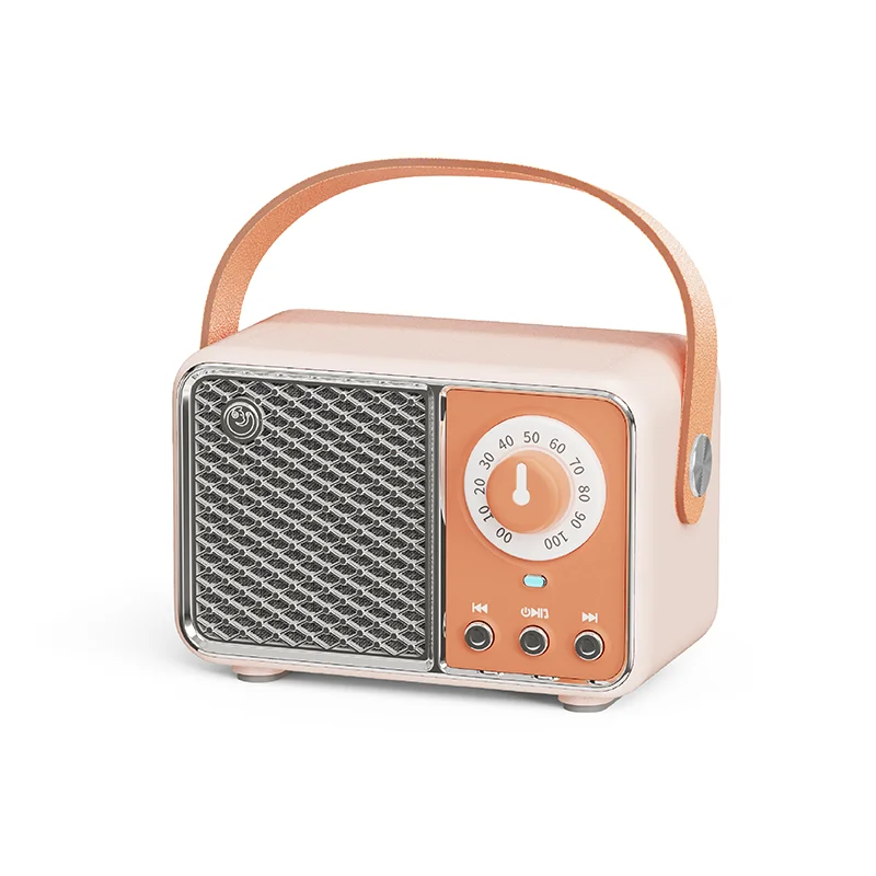 Pastel pink and peach retro som portable bluetooth with mesh speaker grille and leather handle for handfree mini subwoofer use
