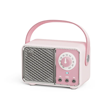 Pink retro-style som portable bluetooth speaker with silver mesh grille, circular dial, and handfree mini subwoofer function