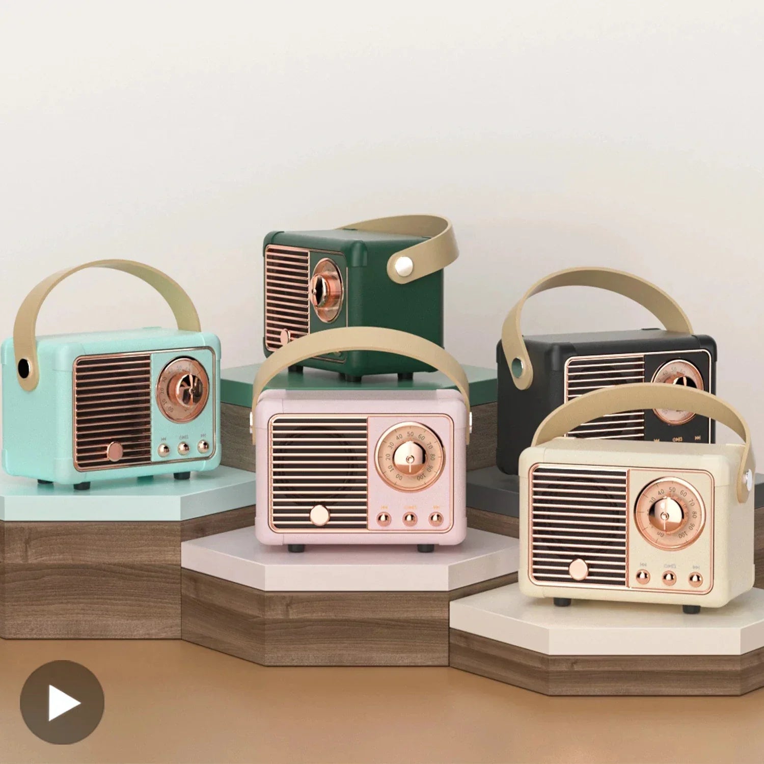Pastel-colored retro som portable bluetooth speakers with copper-toned dials and handles and handfree mini subwoofer features