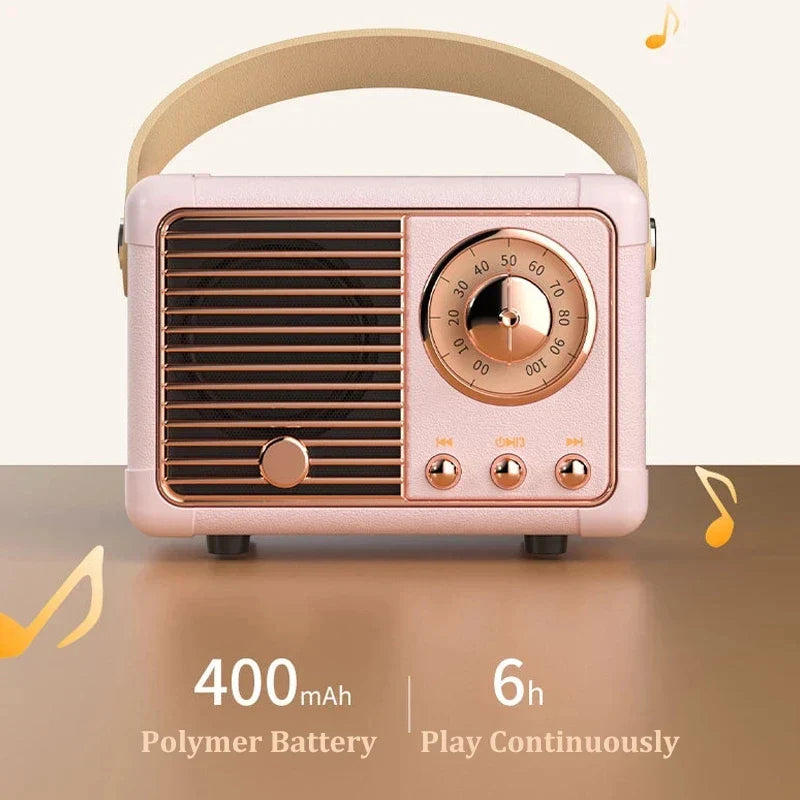 Rose gold vintage-style som portable bluetooth speaker with beige handle and copper dials for handfree mini subwoofer use