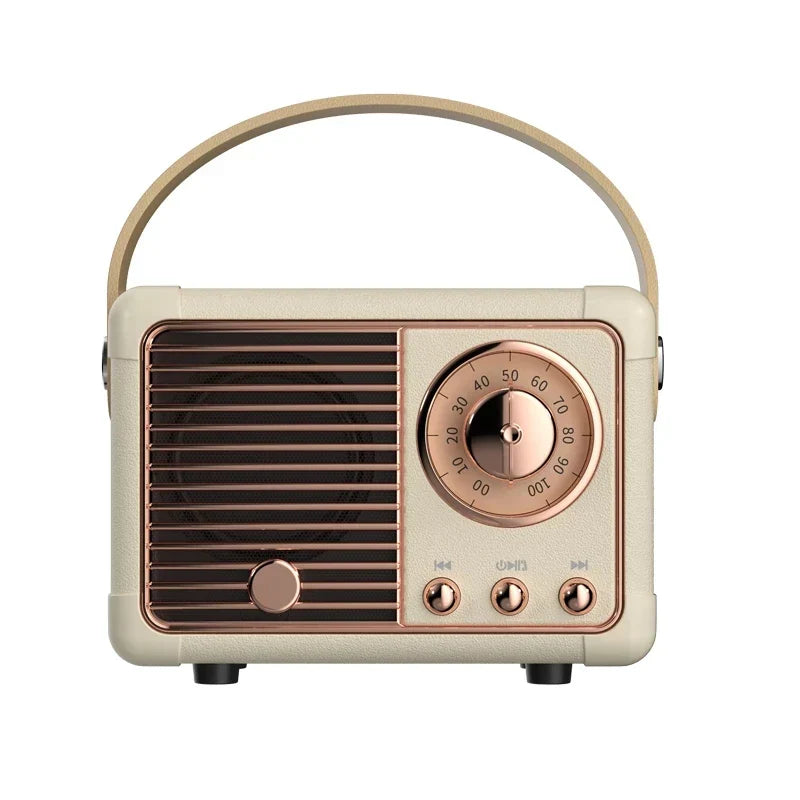 Cream-colored som portable bluetooth speaker with rose gold accents, circular dial, top handle, and handfree mini subwoofer