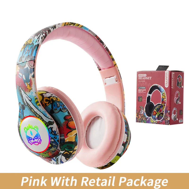 Pink wireless headset flash with mic bluetooth headsets featuring vibrant graffiti design and glowing rgb skull emblem for kids