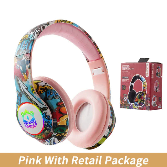 Pink wireless headset flash with mic bluetooth headsets featuring vibrant graffiti design and glowing rgb skull emblem for kids