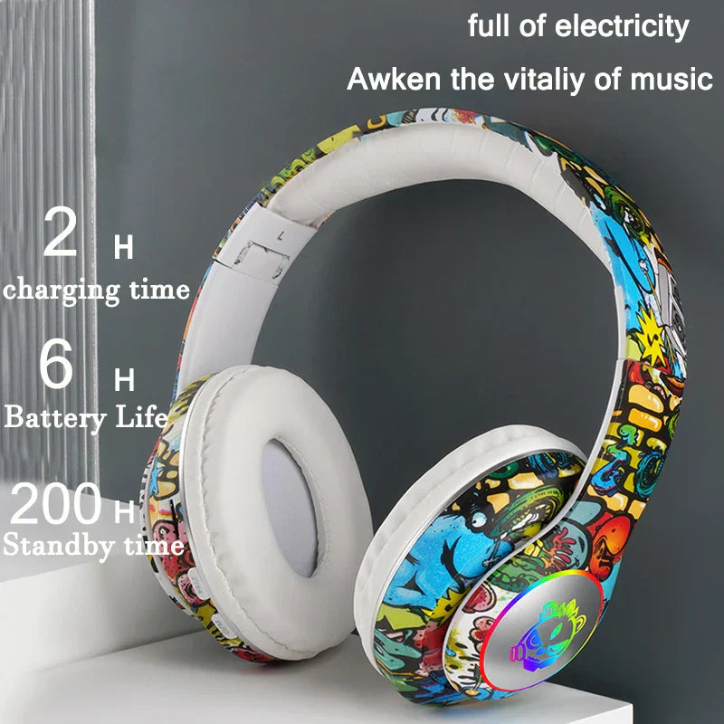 Vibrant graffiti wireless headset flash with white padded earcups and rgb-lit control button for game headphone girls use