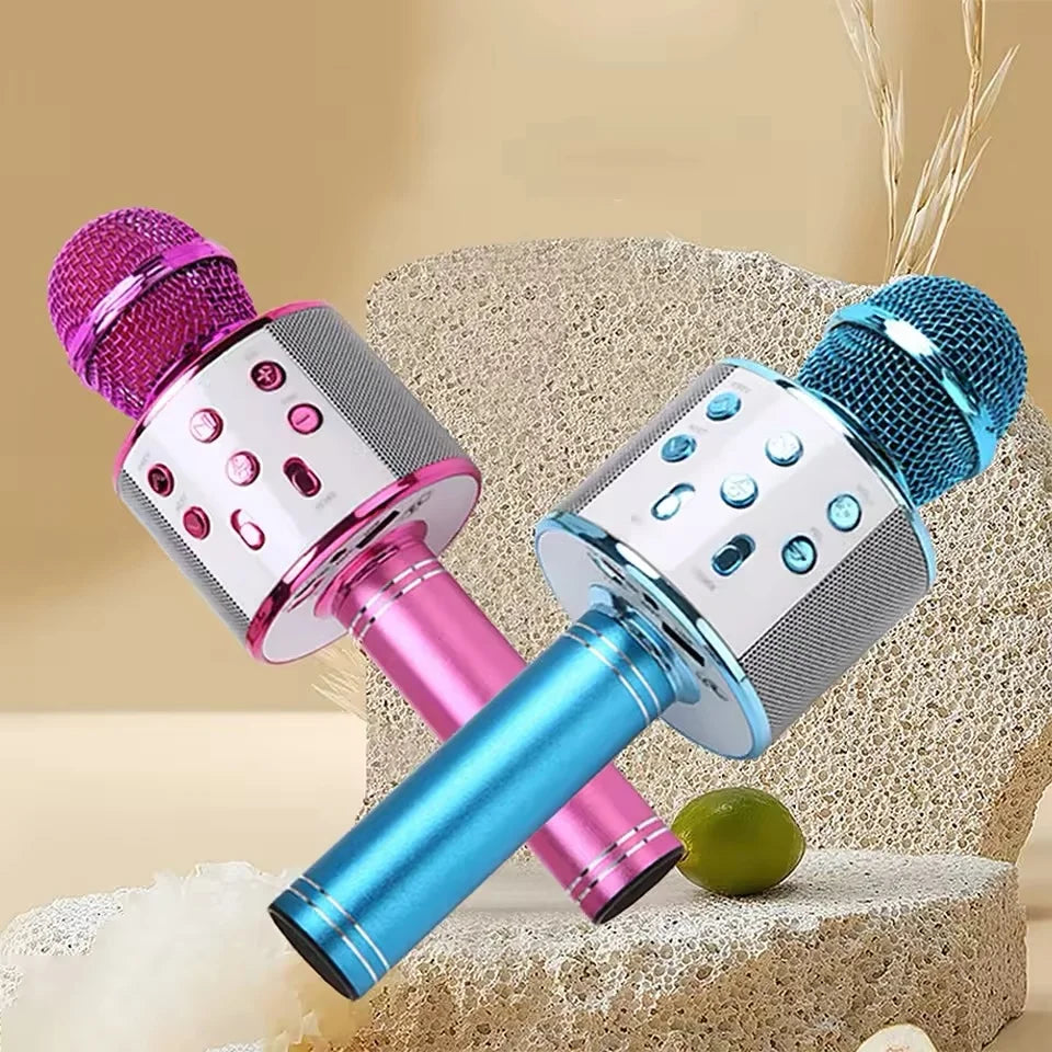 Pink and blue wireless karaoke microphones with metallic finishes and mesh grilles portable handheld mic for party use