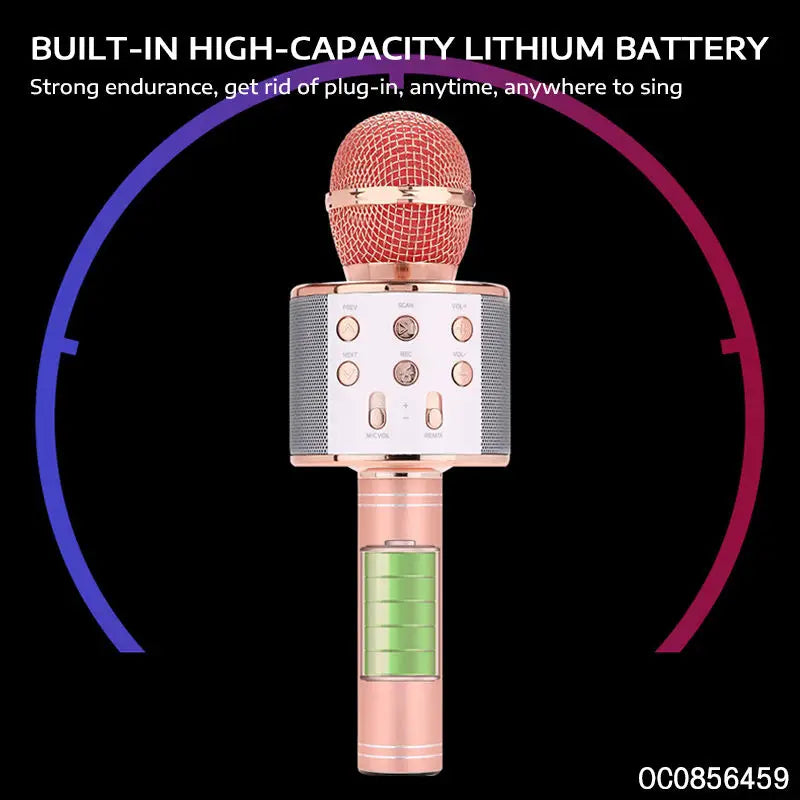 Rose gold wireless karaoke microphone with mesh grille silver control panel and illuminated green battery indicator for parties
