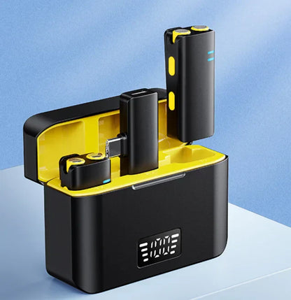 Black and yellow wireless lavalier microphone earbuds in sleek charging mini mic case with digital display for podcasts streaming interviews