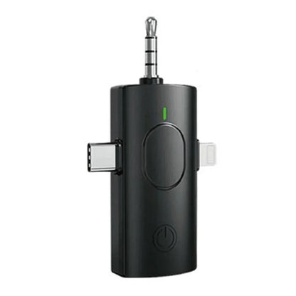 Black wireless audio adapter with green power indicator usb-c lightning ports and 3.5mm jack for wireless lavalier microphones and noise reduction