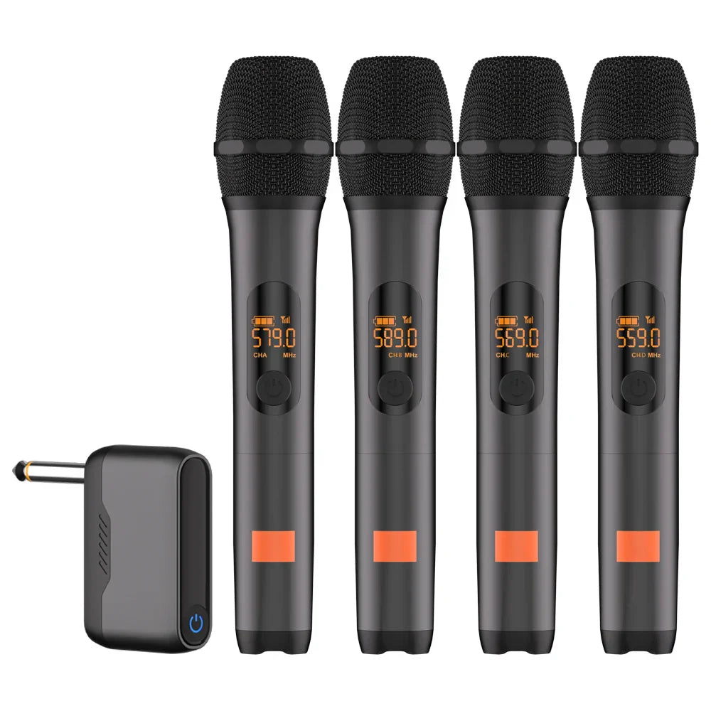 Set of four black wireless microphones with orange frequency displays and rechargeable receiver cordless for church party speaker