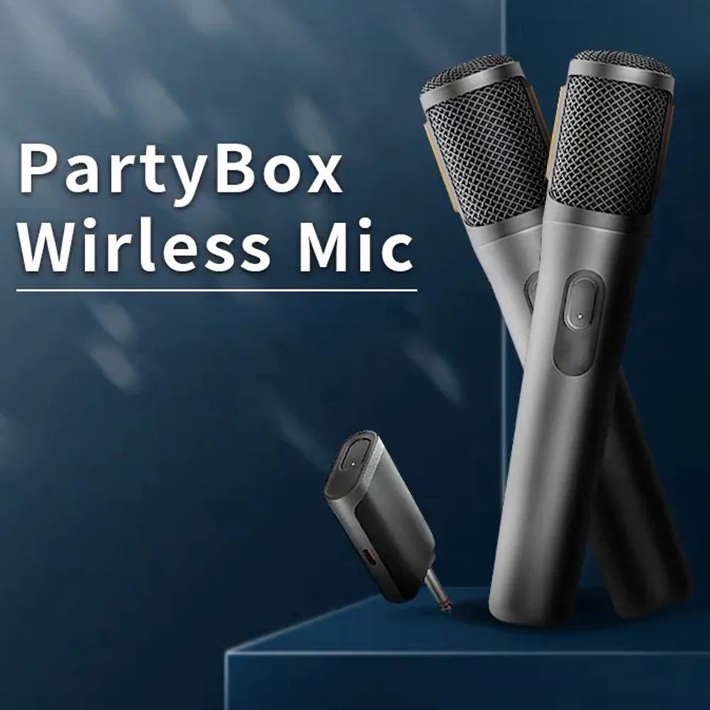 Pair of sleek silver wireless microphone uhf handheld microphones with black mesh grilles and rechargeable receiver partybox wireless mic