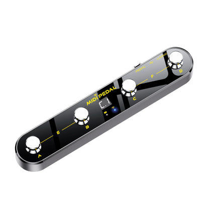 Black midi pedal with silver knobs and yellow labeling featuring a digital display and wi-fi icon for wireless midi control with usb rechargeable lithum battery